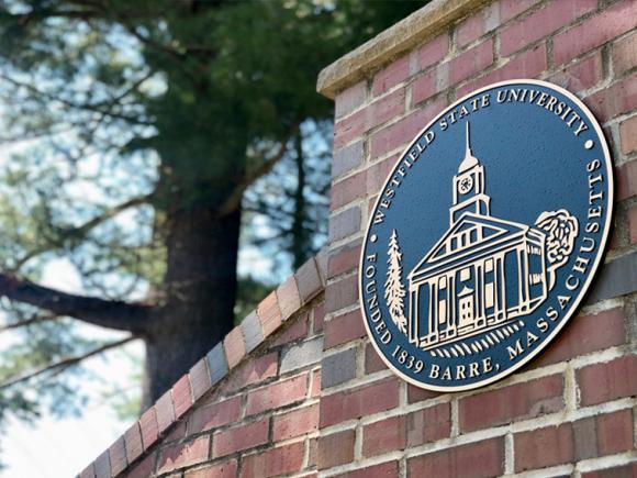 The Westfield State University Seal on the main campus gate