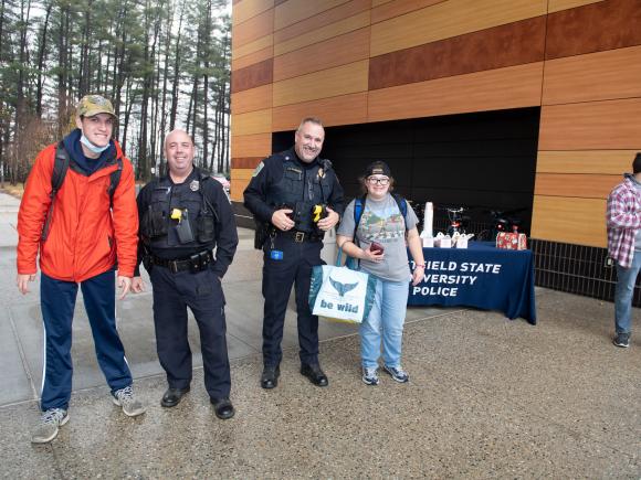 WIPSE students and University police at a Stuff a Cruiser Event on campus.