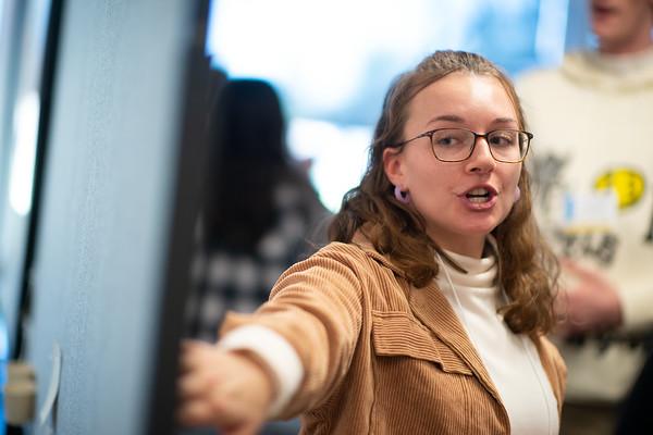 Westfield State student explaining research at CURCA event