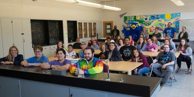 Westfield State Inclusive Postsecondary Education classroom of smiling students.