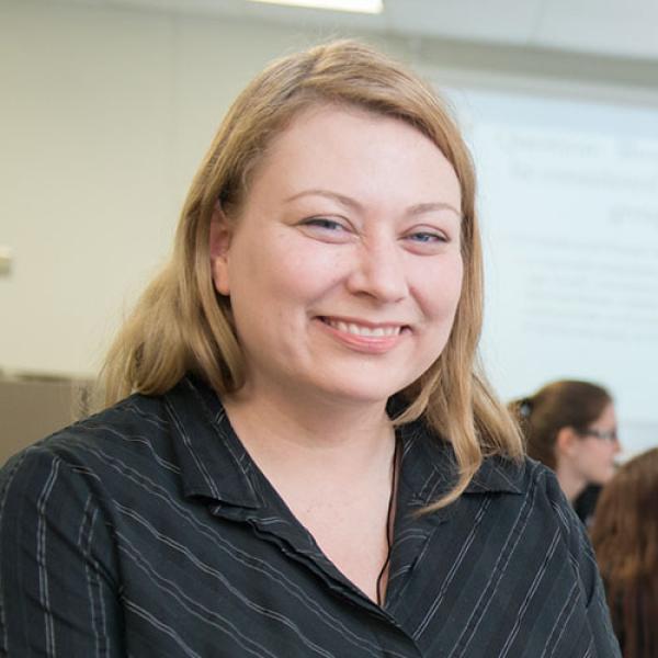 Tamara Smith, Chair of the Hispanic, Liberal, and Interdisciplinary Studies Department at Westfield State University, smiles while posing for a photo.
