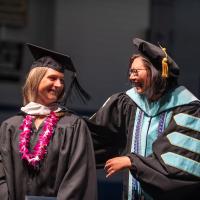 School Counseling student at Commencement with faculty member