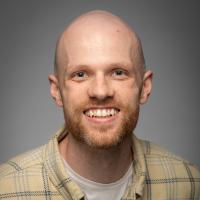 Headshot of Dr. Jared Deighton.